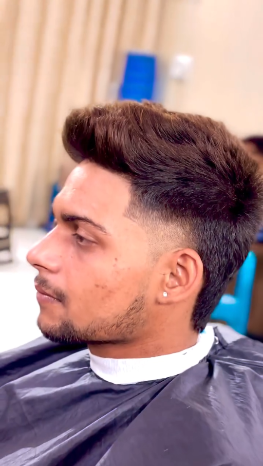 High fade textured quiff men’s haircut – thick volume top, modern stylish hairstyle, skin fade sides, barber expert finish – CXI Salon Palwal, best men haircut near me, Haryana