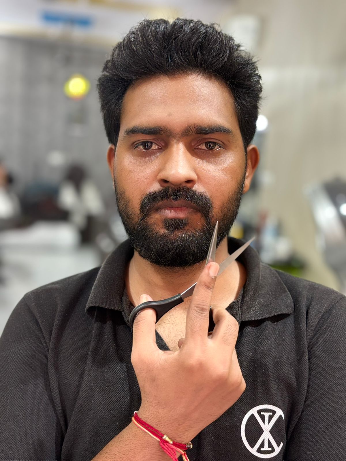 Aakash - Professional Barber at CXI Hair Salon